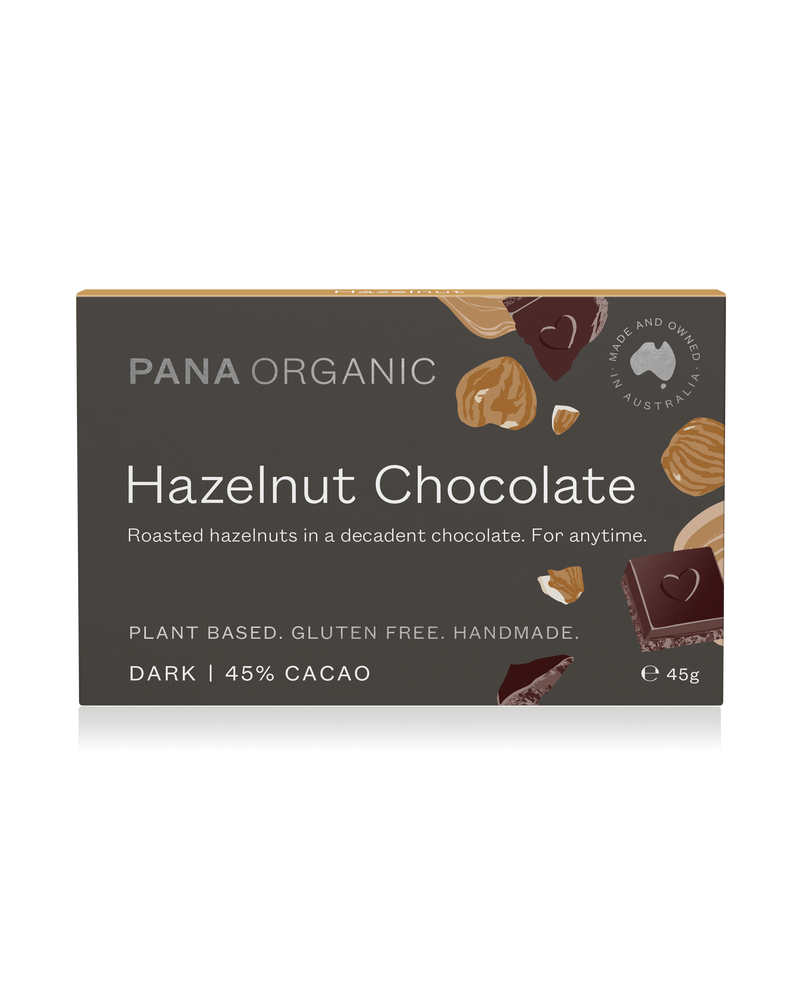 A rich, bittersweet dark chocolate bar with whole organic hazelnuts, offering a smooth and crunchy texture. Certified vegan and gluten-free.