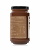 A generous-sized jar of crunchy hazelnut chocolate spread with roasted organic hazelnuts.