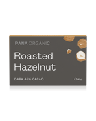 A rich, bittersweet dark chocolate bar with whole organic hazelnuts, offering a smooth and crunchy texture. Certified vegan and gluten-free.