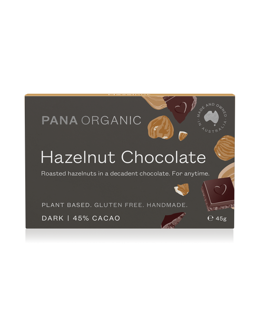 A rich, bittersweet dark chocolate bar with whole organic hazelnuts, offering a smooth and crunchy texture. Certified vegan and gluten-free.